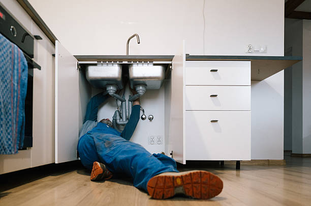 Professional Drain Cleaning technician working in Summerville, GA